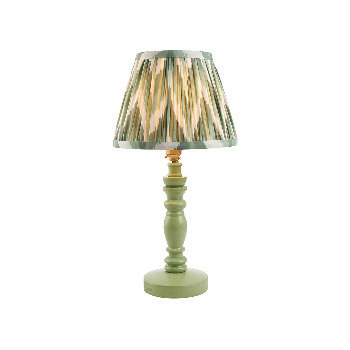 Endon Aldworth table lamp with a turned green wooden spindle base and handmade pleated Zigzag shade in green, cream and grey, on a white background.