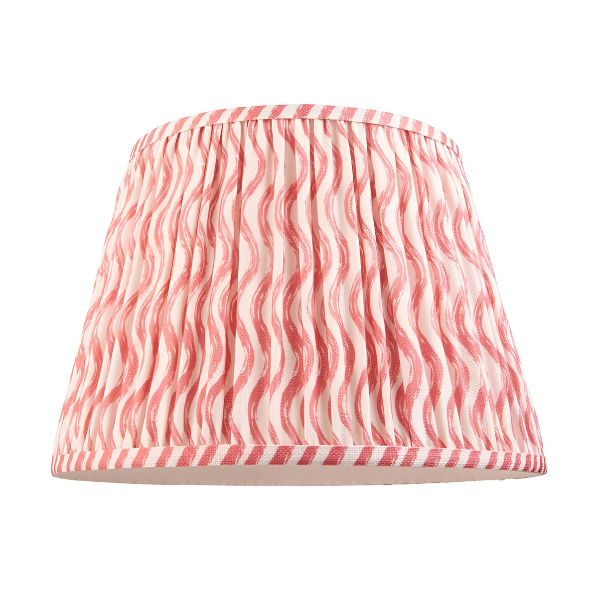 Endon Bevbury Ripple pleated tapered lamp shade in pink and cream wavy patterned faux linen with striped taped edging, on a plain white background.