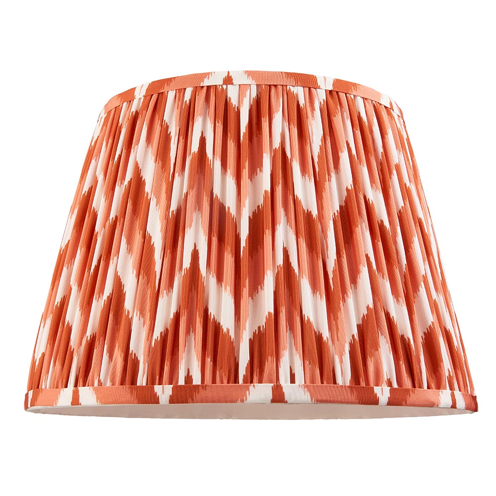 Brenleigh Zigzag Floor Lamp shade shown alone, a pleated faux silk drum shade in orange and white zigzag pattern, on a plain white background.