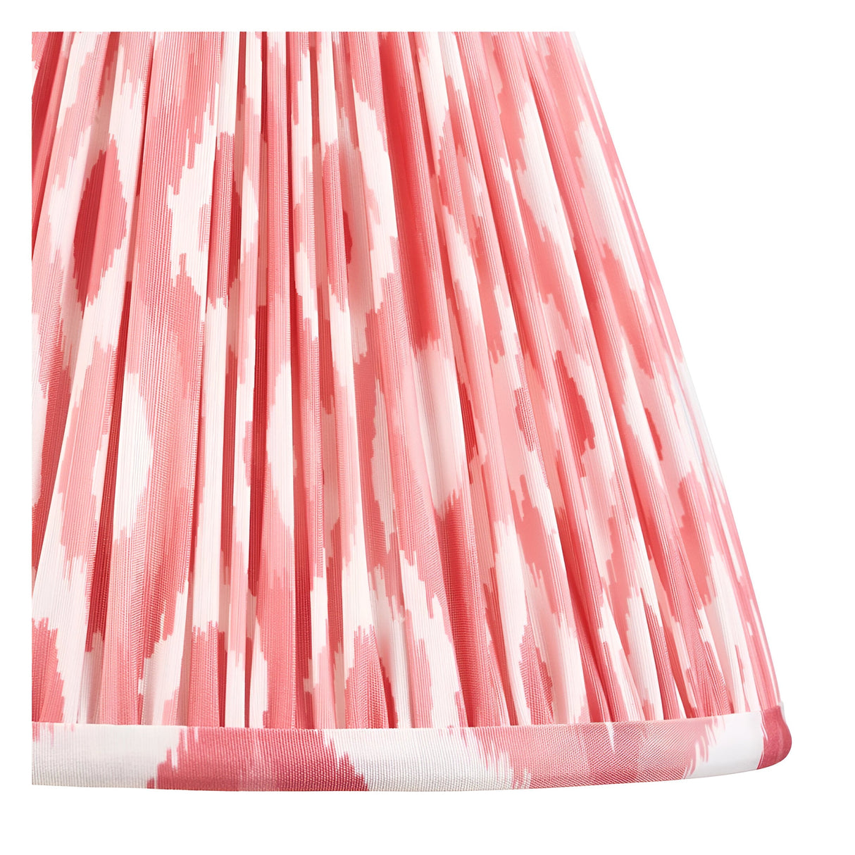 Close-up of the Endon Carlworth Ikat Table Lamp II's handmade pleated faux silk shade in pink clay and coral ikat print.