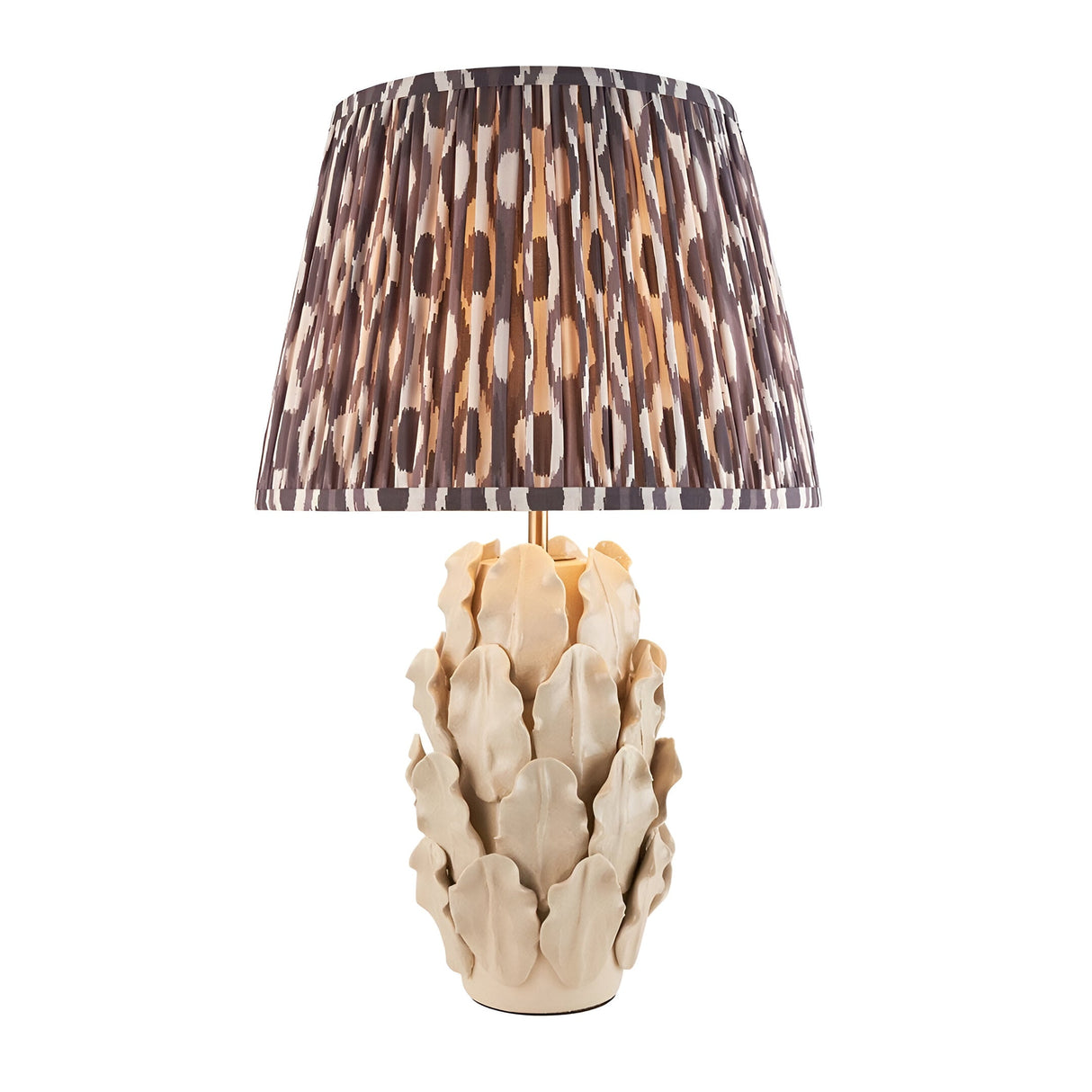 Endon Caldford Ikat 35cm table lamp with sculpted ivory ceramic leaf base and pleated grey, cream and brown Ikat print shade on a white background.