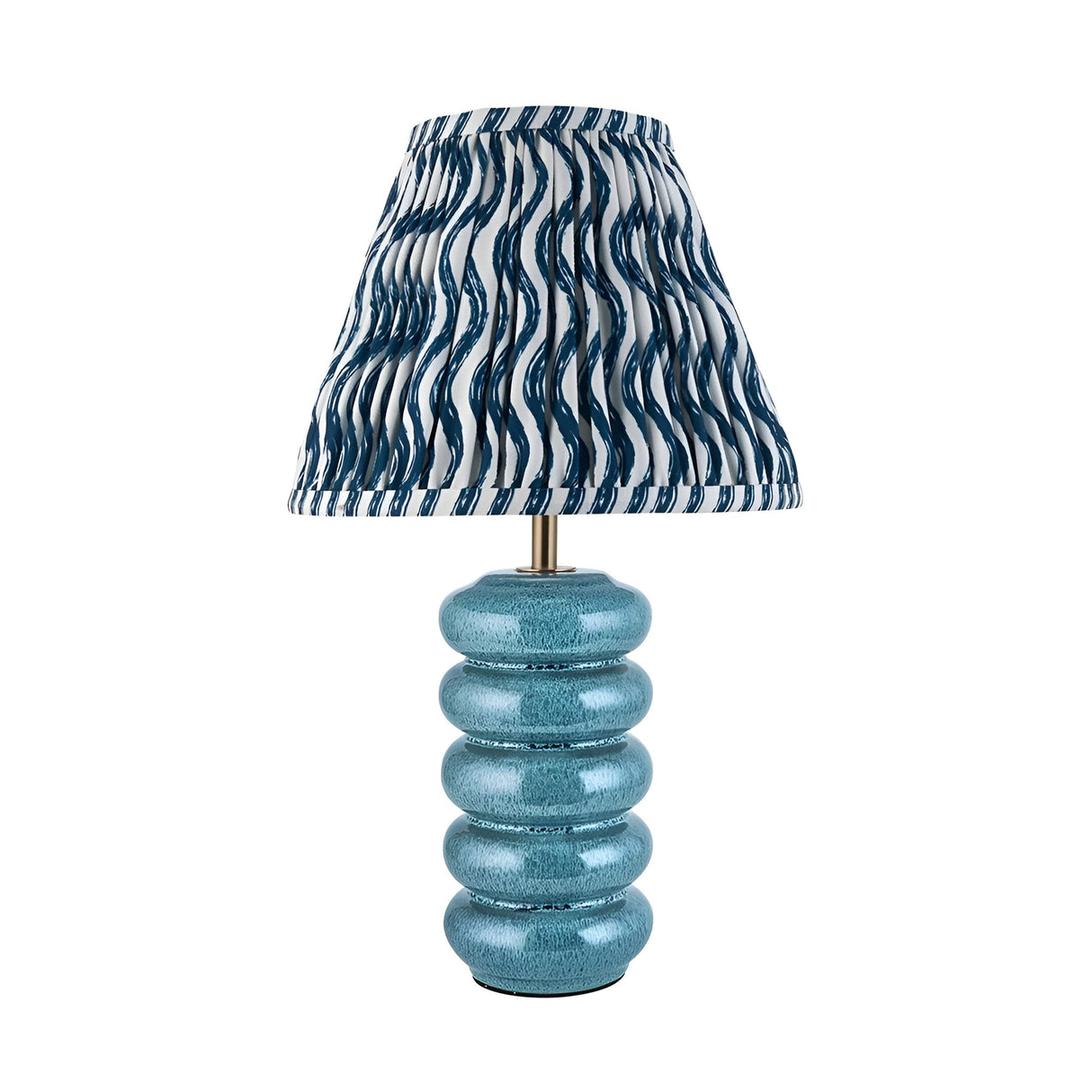 Cliffstead Table Lamp with ribbed blue ceramic base, brass fitting, and pleated blue and white patterned Ripple shade on a white background.