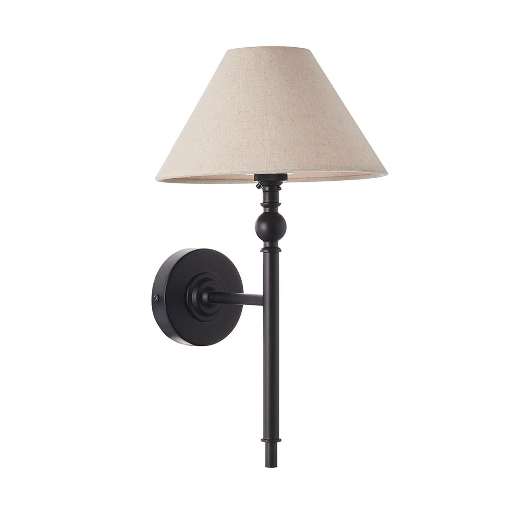 Endon Caldmere wall light with tapered natural linen shade and matt black metal stem on a round wall plate, shown on a plain white background.