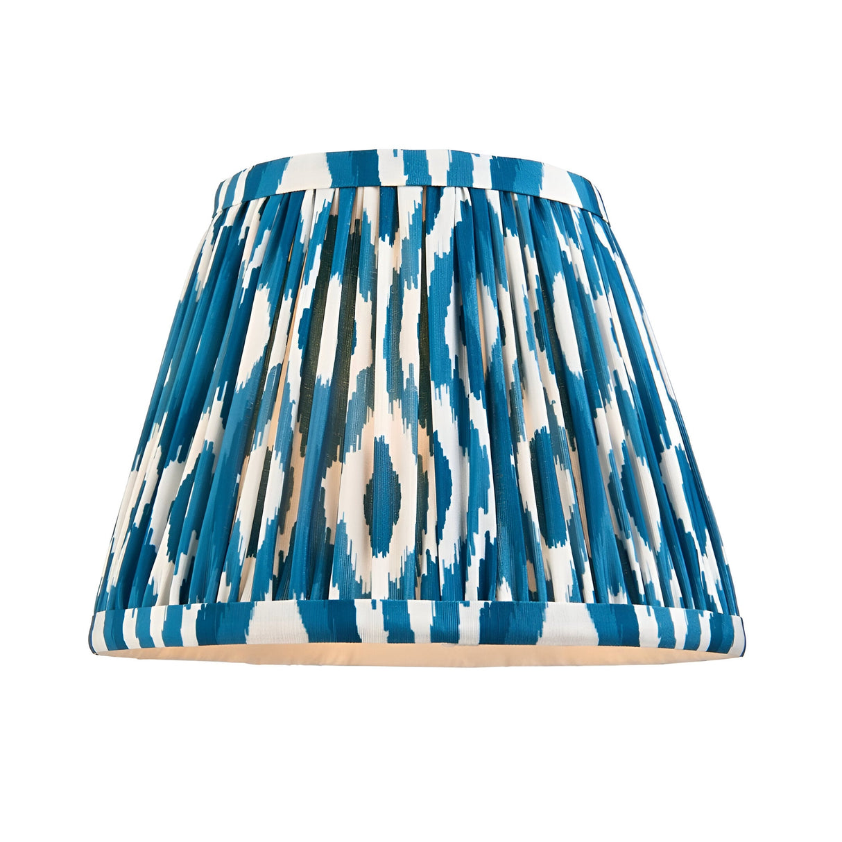 Caldmere Ikat Wall Light in Blue, featuring a pleated tapered fabric shade with an ikat pattern in blue and white, shown on a plain white background.