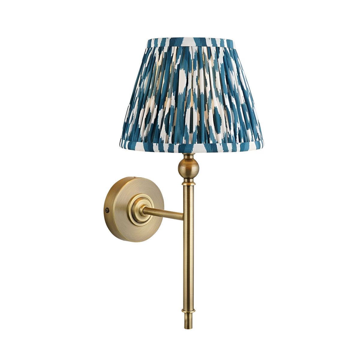Caldmere Ikat Wall Light in Blue with a pleated tapered fabric shade, antique brass arm, and round wall mount, shown on a white background.