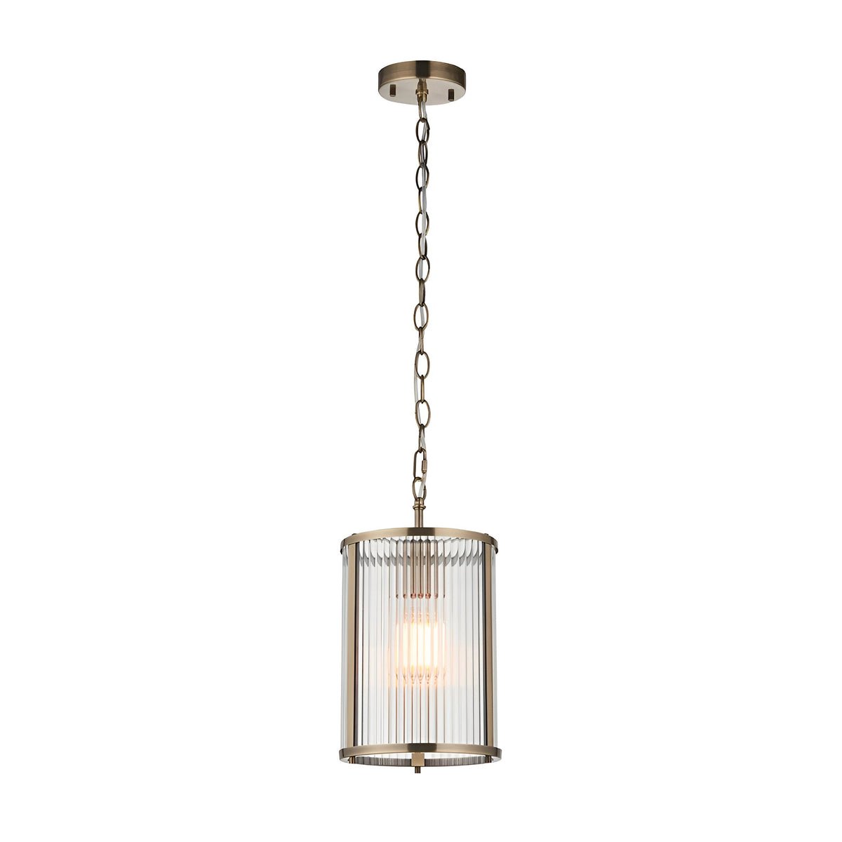 Endon Rothbury small pendant light with a cylindrical ribbed clear glass shade and antique brass frame, suspended from a chain on a plain background.