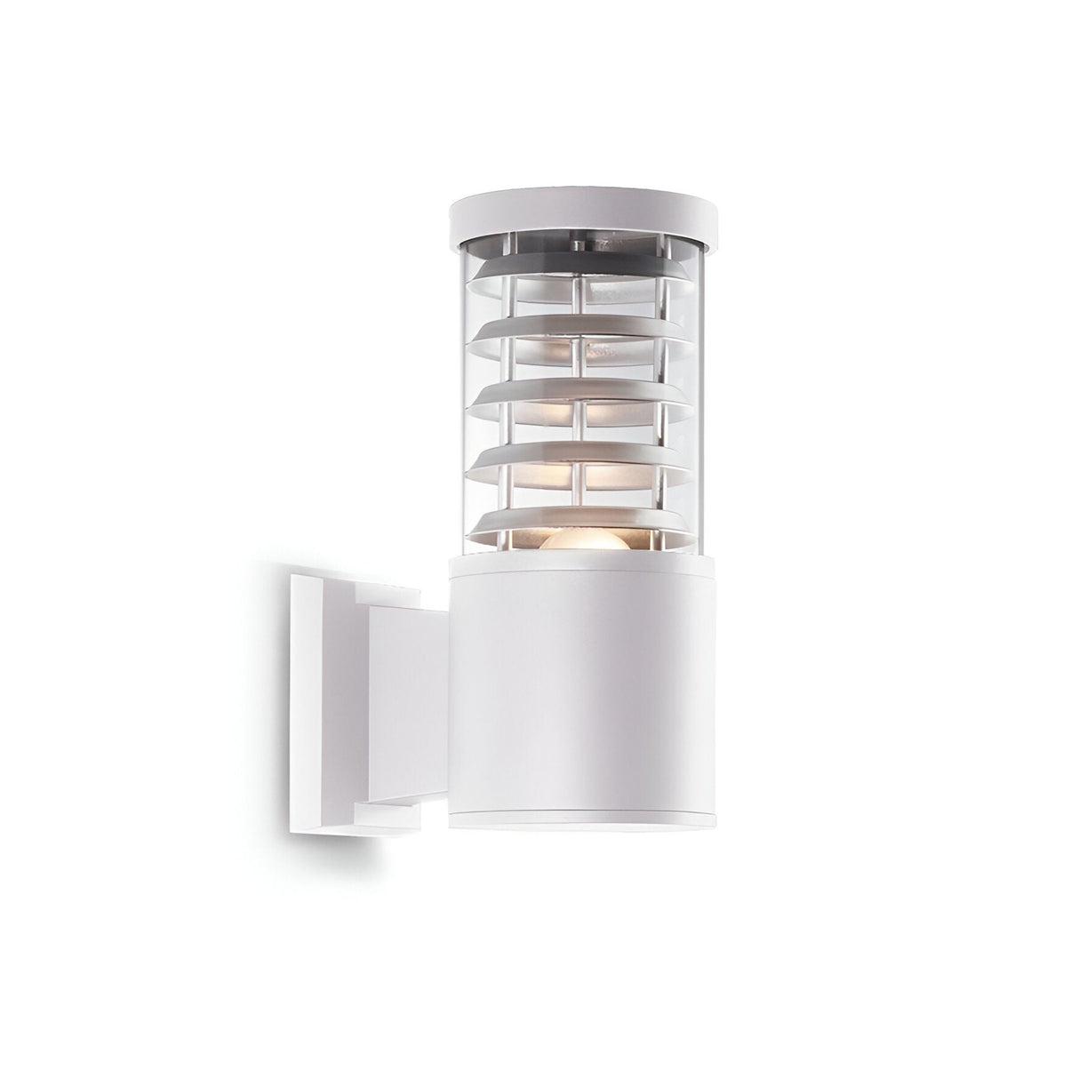 The Luminis Outdoor Wall Light - White is a sleek and contemporary cylindrical fixture designed for outdoor use. It showcases a Pyrex glass diffuser, complemented by horizontal metal rings encircling the bulb. The light is mounted on a sturdy, flat rectangular bracket made from durable die-cast aluminum.