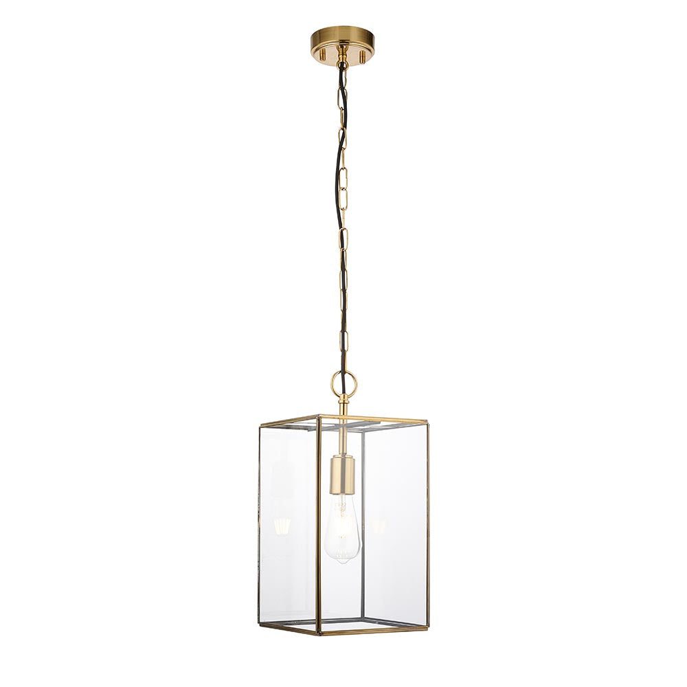 Endon Haddon Grand Pendant in brushed aged brass with clear glass panels, exposed E27 filament bulb, and chain suspension on a white background.