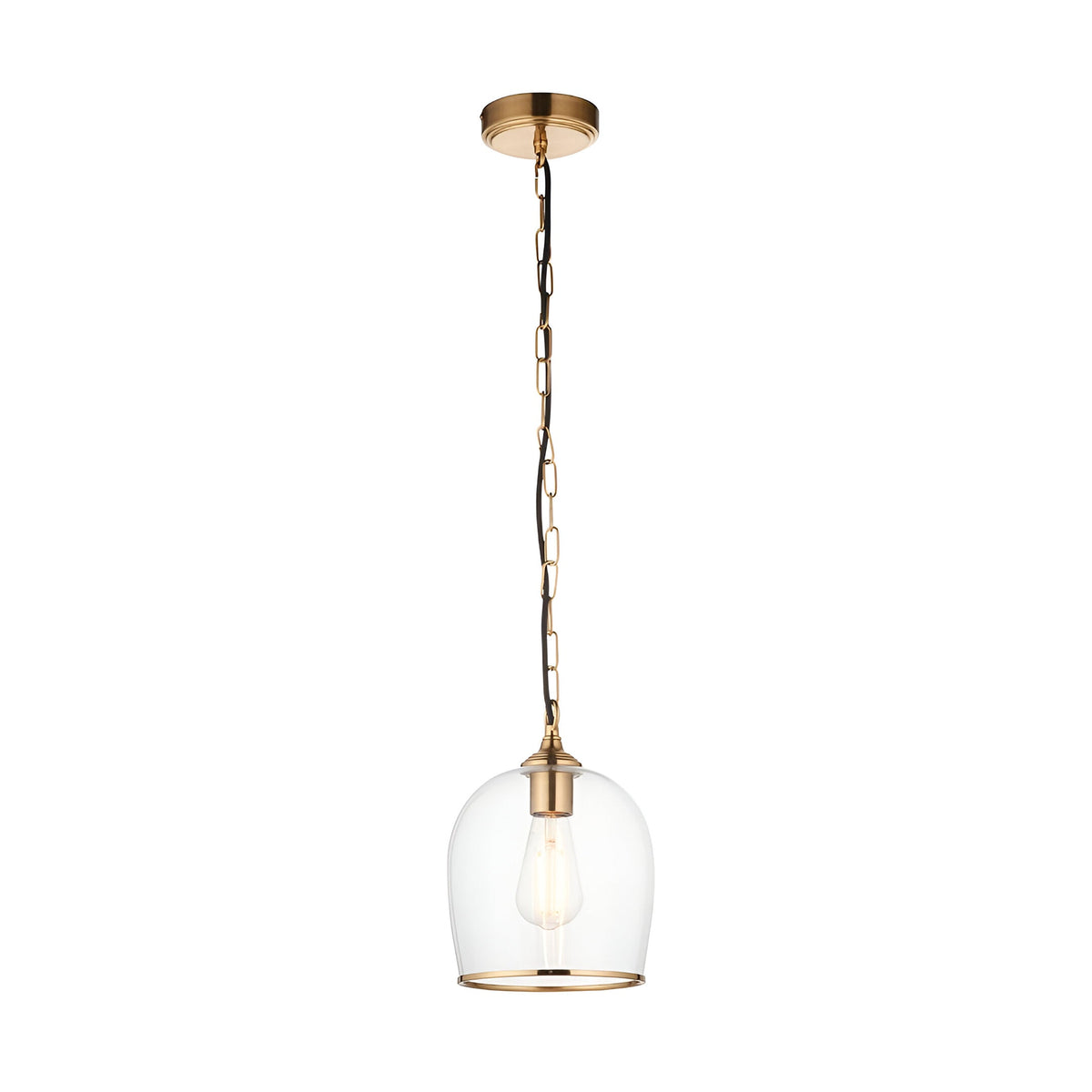 Halstead Pendant in Brass, single-light fixture with clear glass dome shade, brass edge trim, and chain suspension on black flex, shown on a white background.