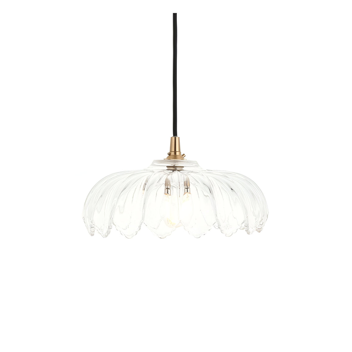 Brackmont Camellia Pendant with a scalloped clear glass shade and brushed brass fitting on a black fabric cable, shown on a white background.