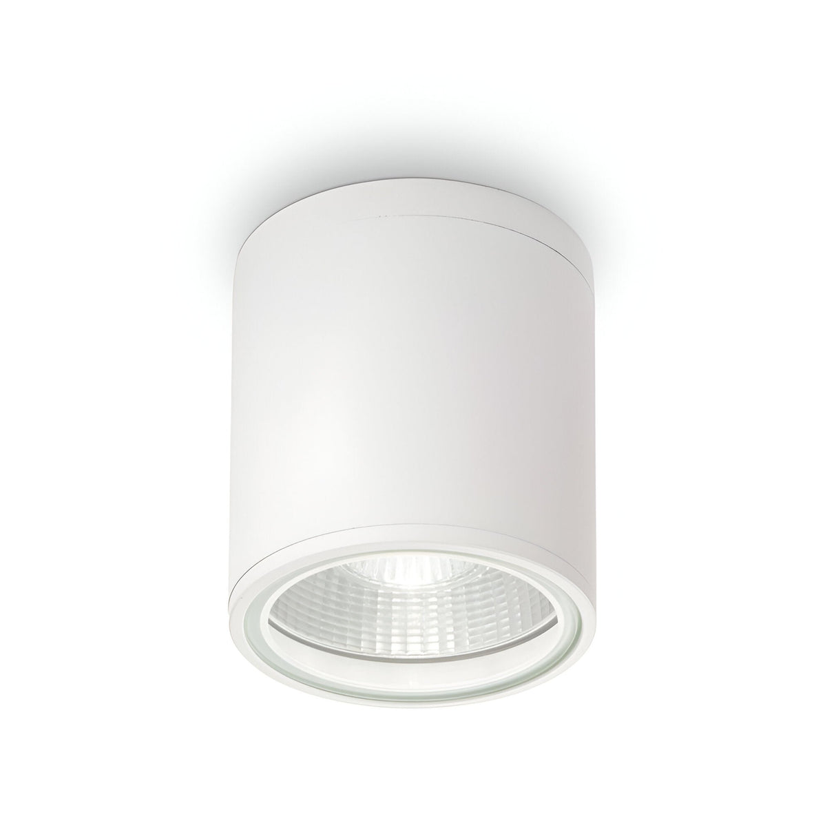 The Solar Downlight - White is a sleek, cylindrical ceiling light fixture with a recessed bulb, designed for surface installation. It's ideal for bathroom lighting and showcases a modern design with a smooth finish and a clear lens cover, adding elegance to any indoor or outdoor space.