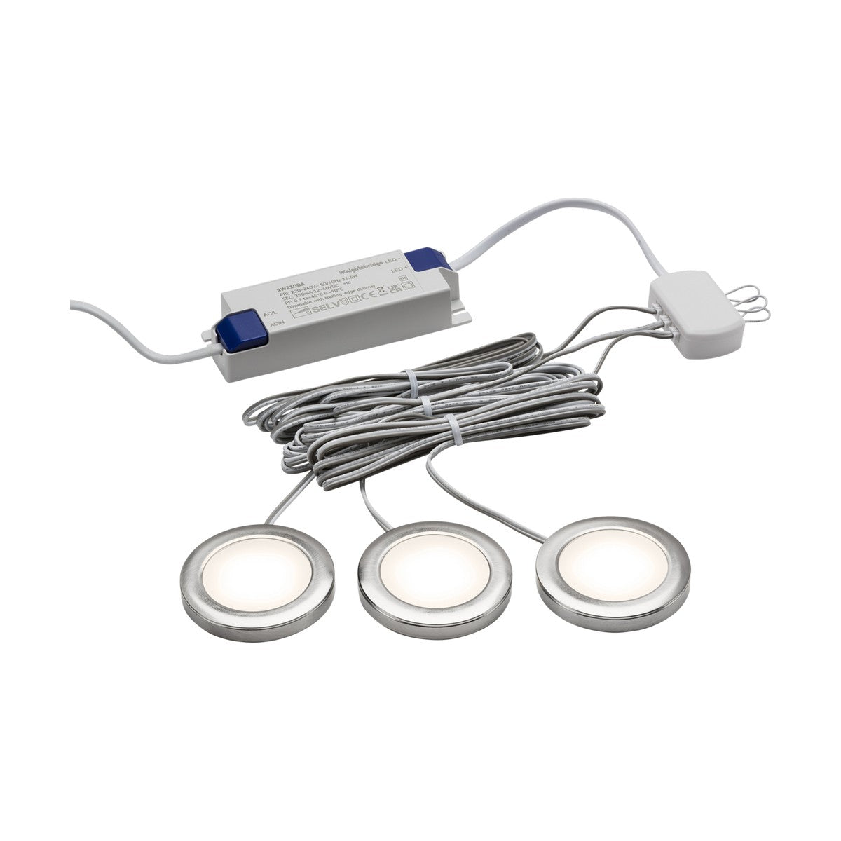 The three 2.5W LED Under Cabinet Lights in a brushed chrome finish are ideal for under cabinet use. These puck lights are connected by coiled wires to a rectangular, dimmable adapter, which comes with a small white plug for easy installation.