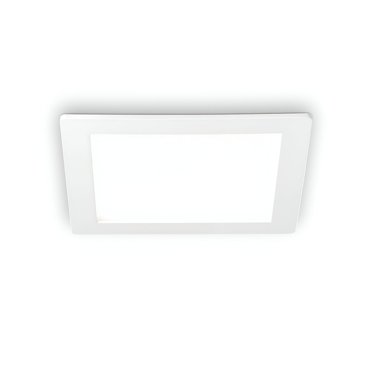 The Focus Square Recessed Downlight - 30W, featuring a minimalist white frame, utilizes an energy-efficient LED to emit a gentle glow at 3000K, softly illuminating the plain white background.
