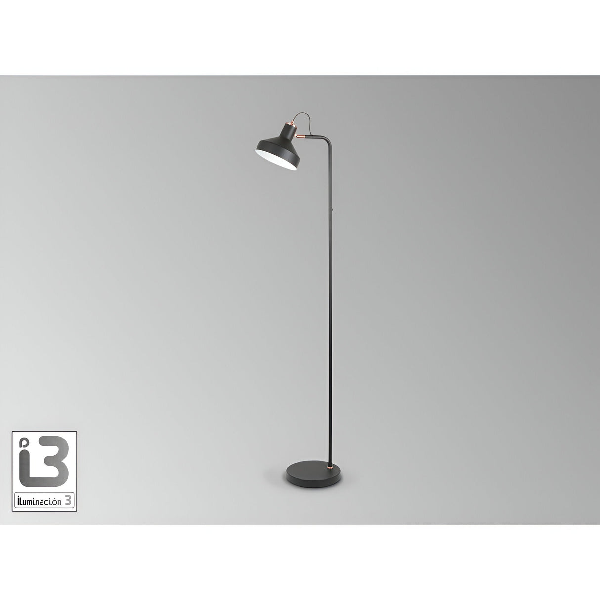 The Irias Floor Lamp in matte black and copper, featuring a round base and angled shade, stands against a plain gray background. The iluminación 3 logo appears in the bottom left corner.