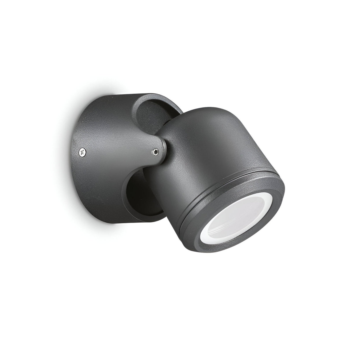A contemporary black adjustable wall-mounted spotlight, featuring a cylindrical design and IP44 rating, set against a white backdrop. The light is angled downward and mounted on a circular base. Product Name: Vista Outdoor Wall Spotlight - Black.