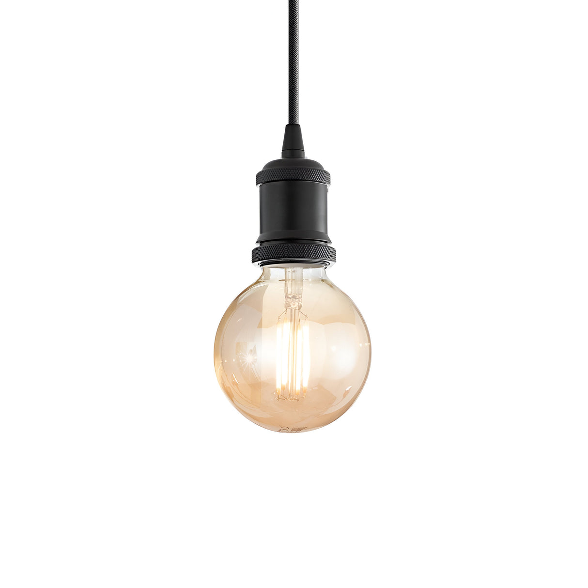 The Zip 1 Light Pendant in black hangs from the ceiling against a plain white background. The decorative bulb's filament is visible, casting a warm glow and enhancing the modern lighting aesthetic.