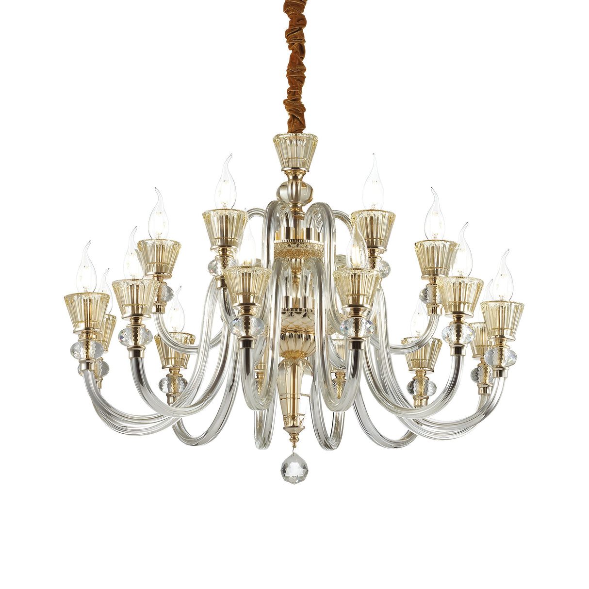 The Nexus 18 Light Chandelier - Gold/Chrome is a luxurious lighting fixture featuring multiple curved arms, each adorned with candle-shaped bulbs. It is elegantly suspended by a brown cord and showcases gold and chrome accents, with amber crystal elements enhancing its gleaming glass design.