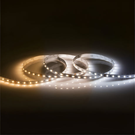 A photo of the 24V CCT LED Strip Light 2700K to 6000K arranged in a wavy pattern. Each of the three strips emits a different shade of light: warm white, neutral white, and cool white. The dark background enhances the glow of these dimmable lights over their full 5m length.