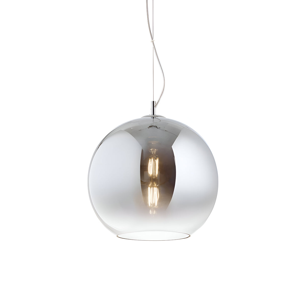 Introducing the Emberlyte 1 Light Glass Pendant in chrome, featuring a sleek spherical glass shade suspended by a slender wire. Inside, you'll find an exposed dimmable E27 bulb that casts a gentle illumination. The glass is adorned with a reflective, metallic finish for a modern touch. This pendant light measures 20cm in diameter.