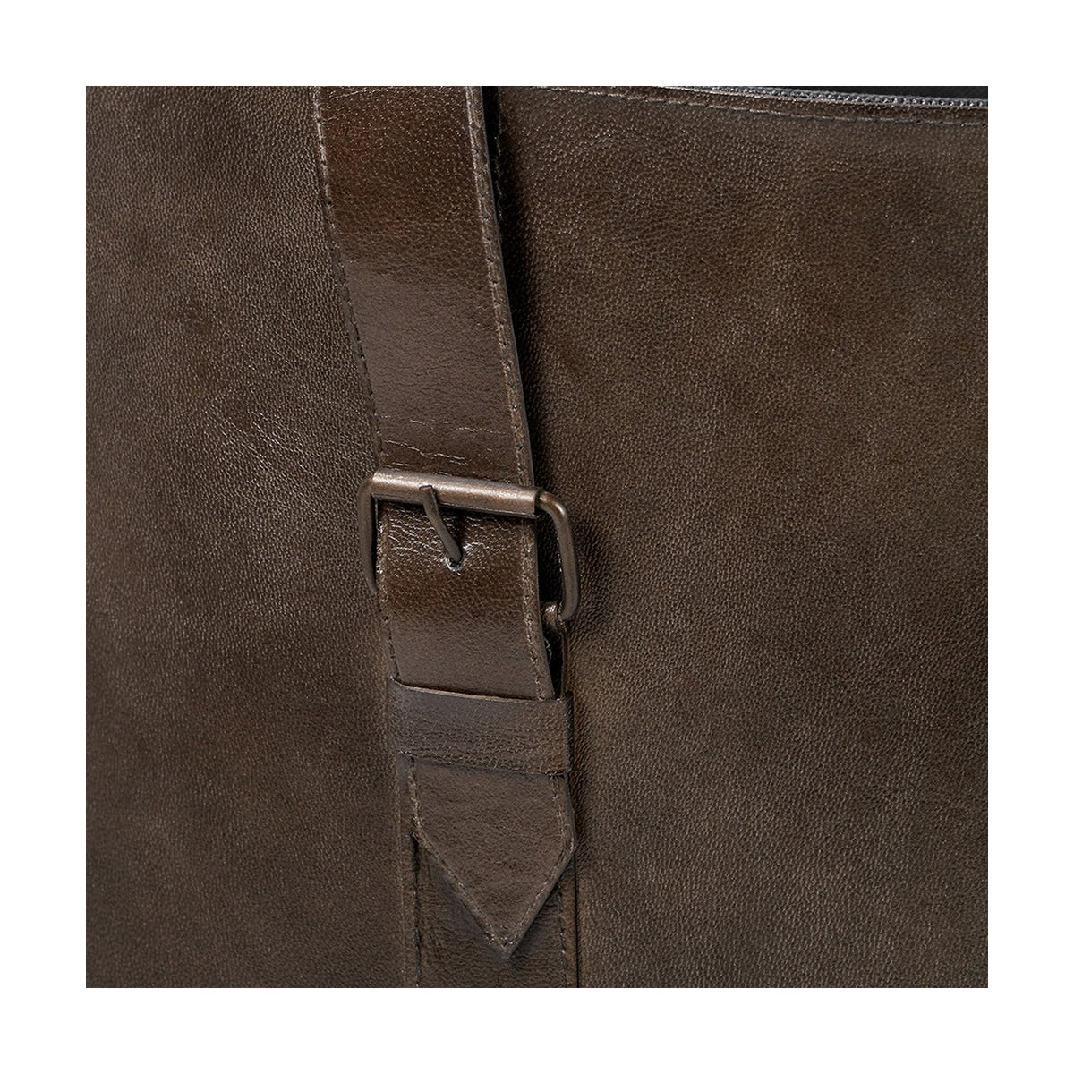 Close-up of the Alessio peppercorn leather storage box showing the handle strap with metal buckle detail against the textured leather surface.