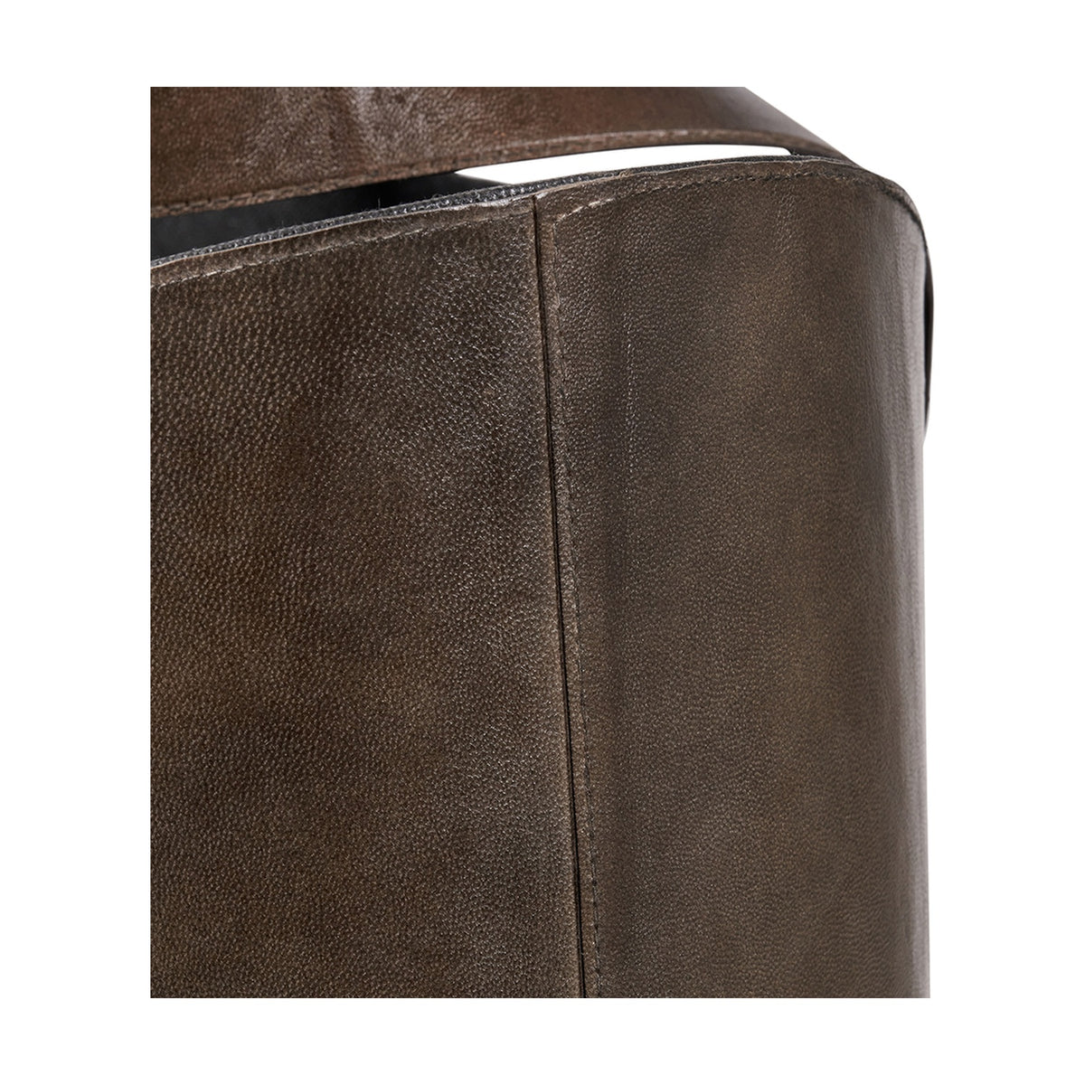 Close-up of the Alessio peppercorn leather storage box showing textured leather panels, a visible vertical seam, and stitched edge detailing.
