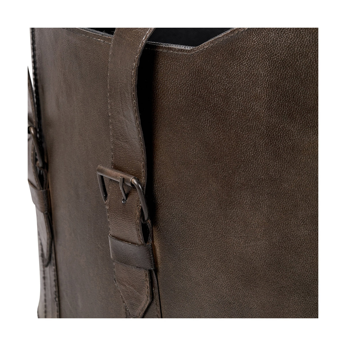 Close-up of the Alessio peppercorn leather storage box showing a textured brown surface, buckled strap detail, and stitched handle against a plain white background.