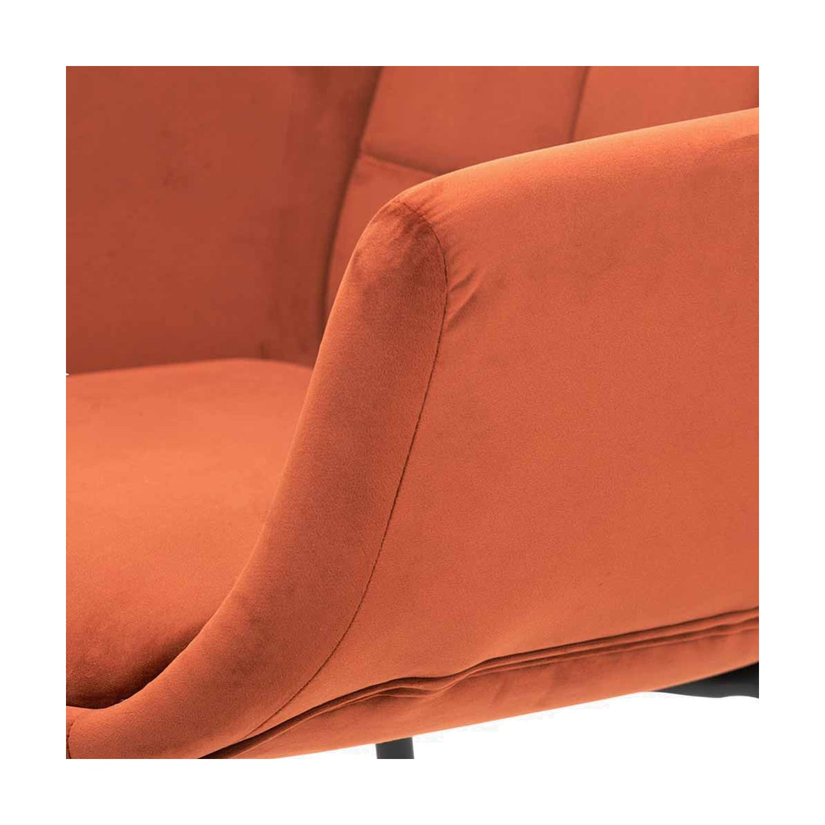 Close-up of the Alba Cinnamon Velvet & Black Metal Carver Dining Chair, showing the curved armrest and seat in cinnamon velvet with visible stitching detail.