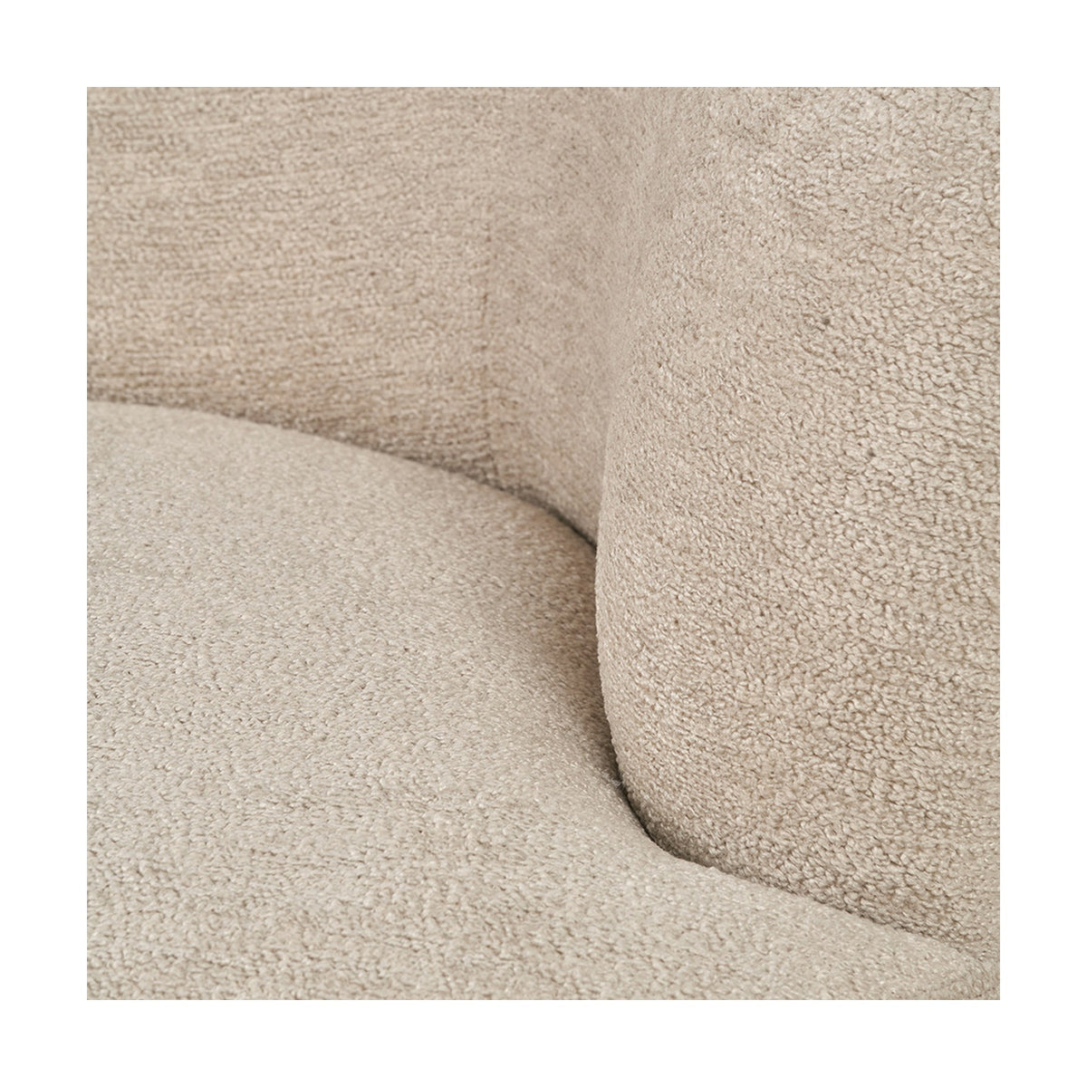 Close-up of the Aviana sofa's taupe teddy fabric upholstery, showing the curved backrest, armrest, and seat cushion texture.