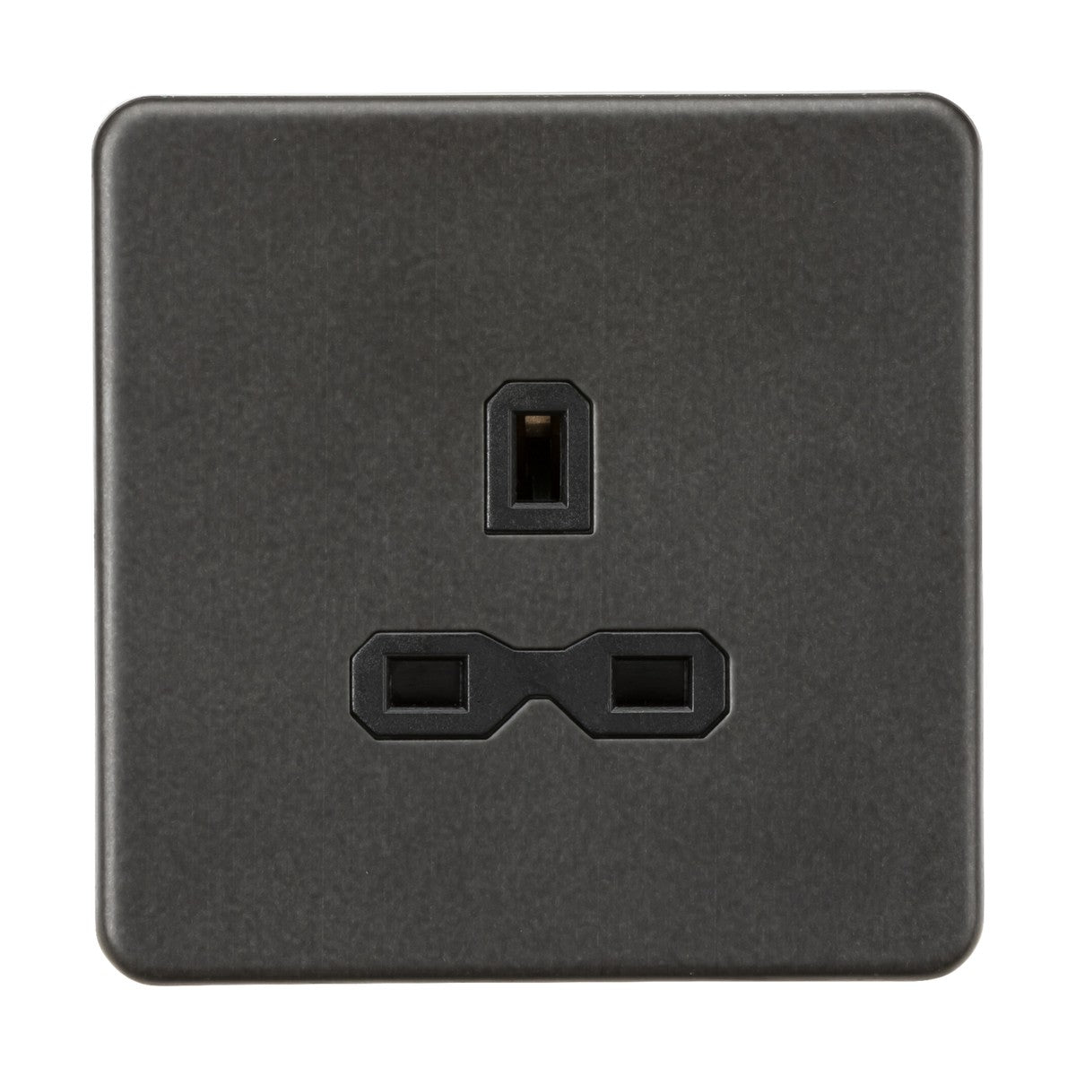 The 13A 1 Gang Unswitched Socket - Smoked Bronze (Black Insert) features three rectangular pin slots in a triangular pattern on a square faceplate, compatible with Type B plugs. The smoked bronze, screwless flat plate design provides a sleek contrast against a plain white background.