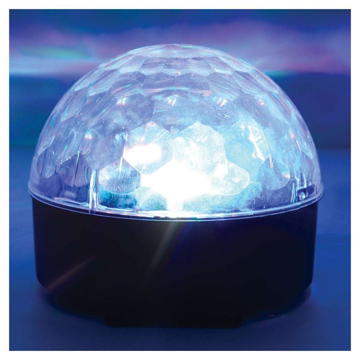 The QTX 6x1W 20W LED Moonglow Light Effect features a faceted, translucent dome that emits a bright blue glow, creating colorful reflections—ideal for vibrant party lighting and enhancing any event’s atmosphere.