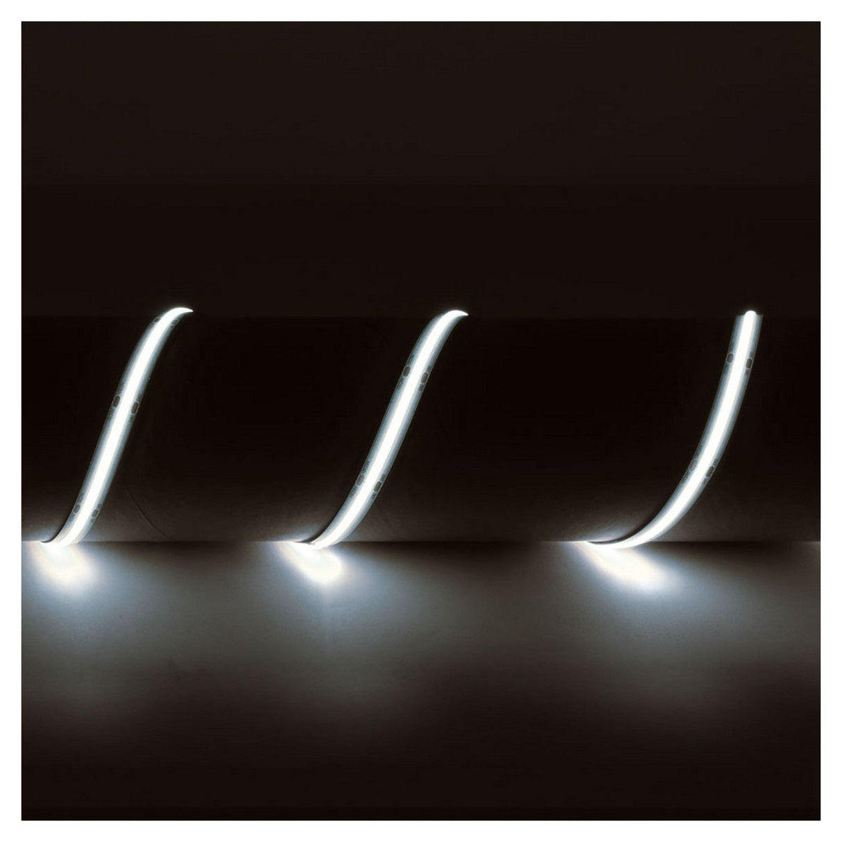 LYYT 24V COB LED Strip Light in a 5m length, rated at 6500K, arranged in a wave pattern on a dark background, casting a seamless and soft glow.