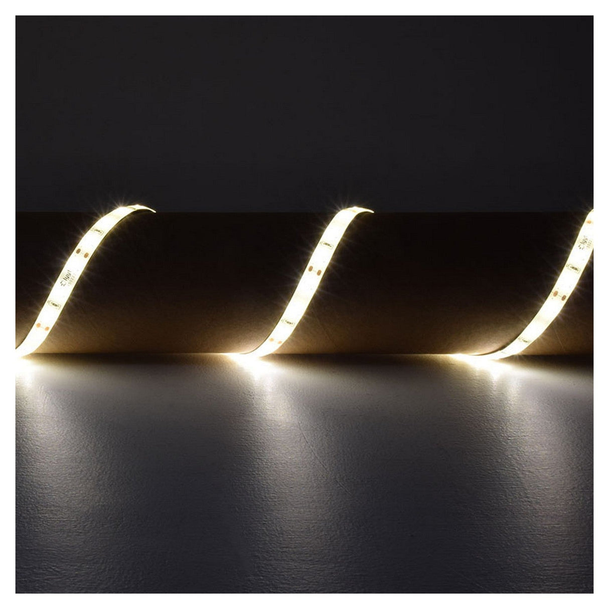 The LYYT 12V SMD2835 Strip Light 5m - 3000K forms a gentle wavy pattern against a dark background. This light strip's super-bright LEDs emit a warm white glow, casting soft reflections on the surface below.
