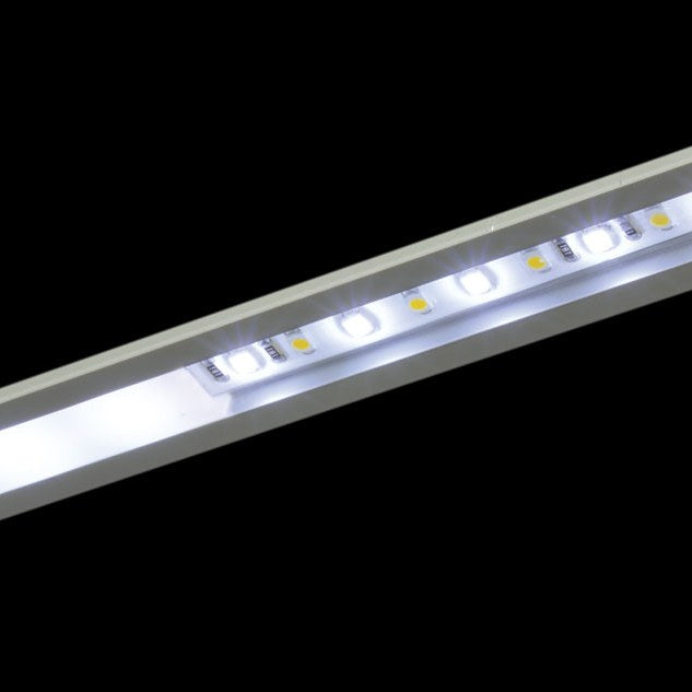 LYYT 2m recessed aluminium LED strip profile by AVSL shown at an angle with illuminated white LEDs visible through the diffuser against a black background.