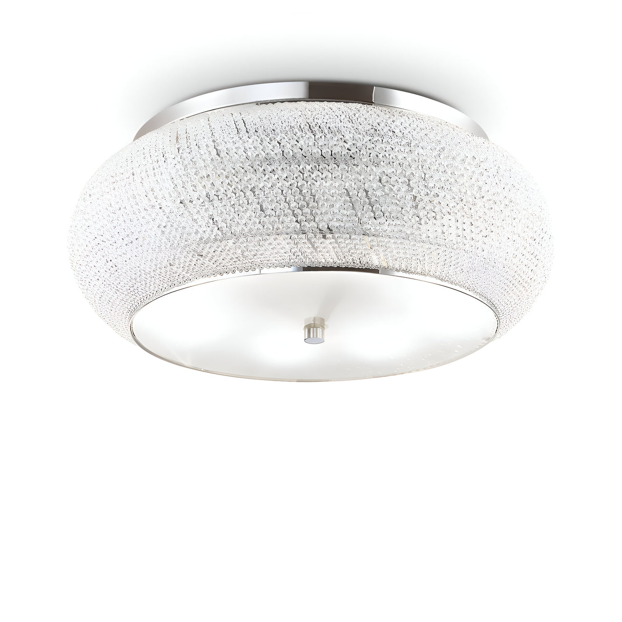 Introducing the Harbor 14 Light Crystal Flush - Chrome: This sleek ceiling light fixture boasts a circular, textured glass shade complemented by chrome accents. It features a frosted glass bottom cover and a central decorative metallic piece, all designed to cast a soft ambient glow.