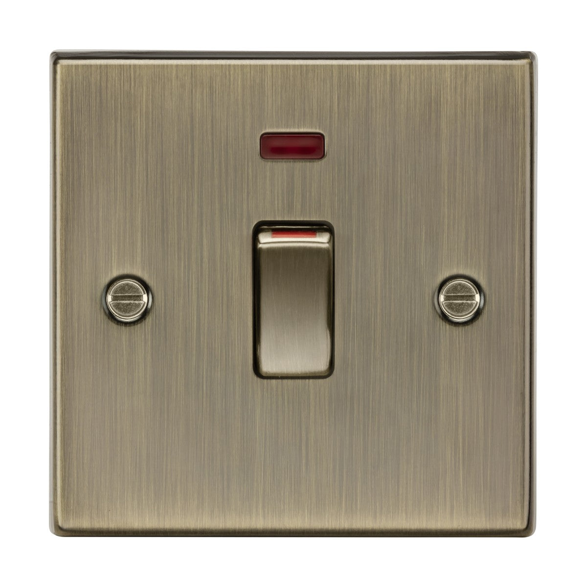The 45A DP Switch Neon (1 Gang Size) in antique brass features a red indicator. The switch is centered with two screws on either side and mounted on a textured brass plate, with the conveniently positioned red indicator light located above the switch for easy visibility.