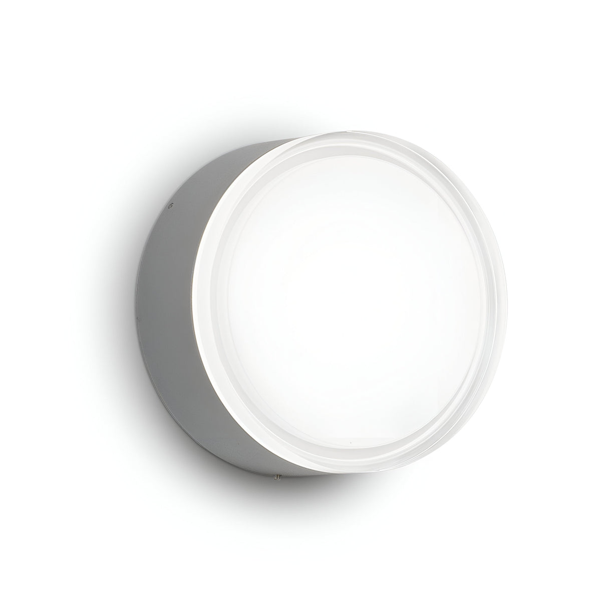 The Aura Large Flush Wall & Ceiling Light in White/Grey is a round, wall-mounted LED fixture featuring a sleek gray housing and a smooth, opaque white cover. Its minimalist design and IP44 rating allow it to blend seamlessly with any plain white background.