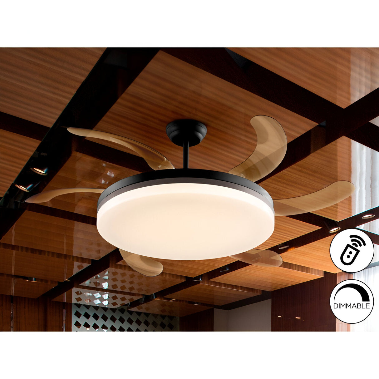 Schuller Vento Maxi CCT LED ceiling fan light with retractable smoke blades, matte black housing, bronze ring and opal diffuser in a wood-beamed room.