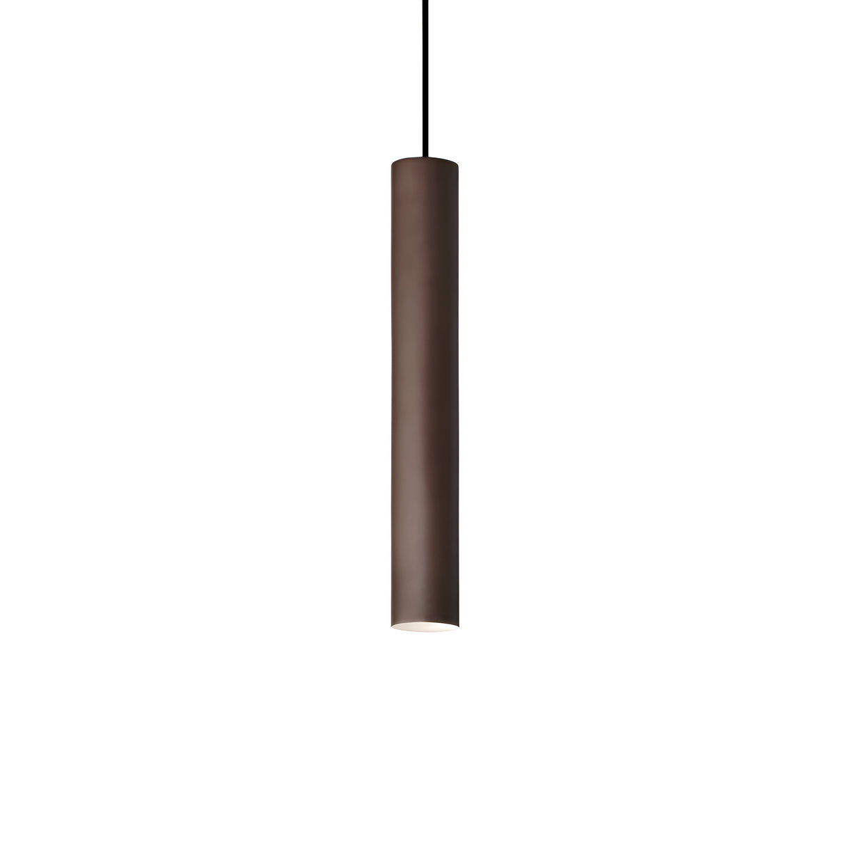 The Noctis 1 Light Pendant – Brown, 6cm, is a sleek cylindrical fixture that hangs gracefully from the ceiling, showcasing an elegantly designed corten finish. Its dark brown hue and smooth matte texture emit a soft glow from the bottom. The adjustable fabric cable enhances its minimalist appeal against a clean white backdrop.