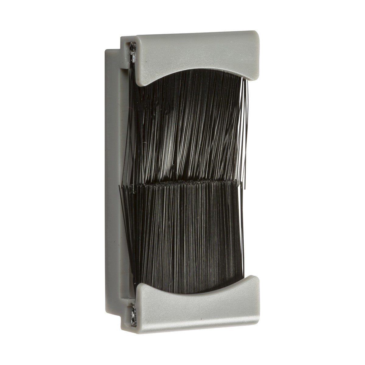 Introducing the Brush Module 25 X 50mm - Grey: a wall-mounted boot scraper featuring black bristles and gray plastic holders at the top and bottom. Perfect for removing mud and debris from your footwear, it enhances a tidy cable entry setup by keeping your space neat and complementing that floating TV look.