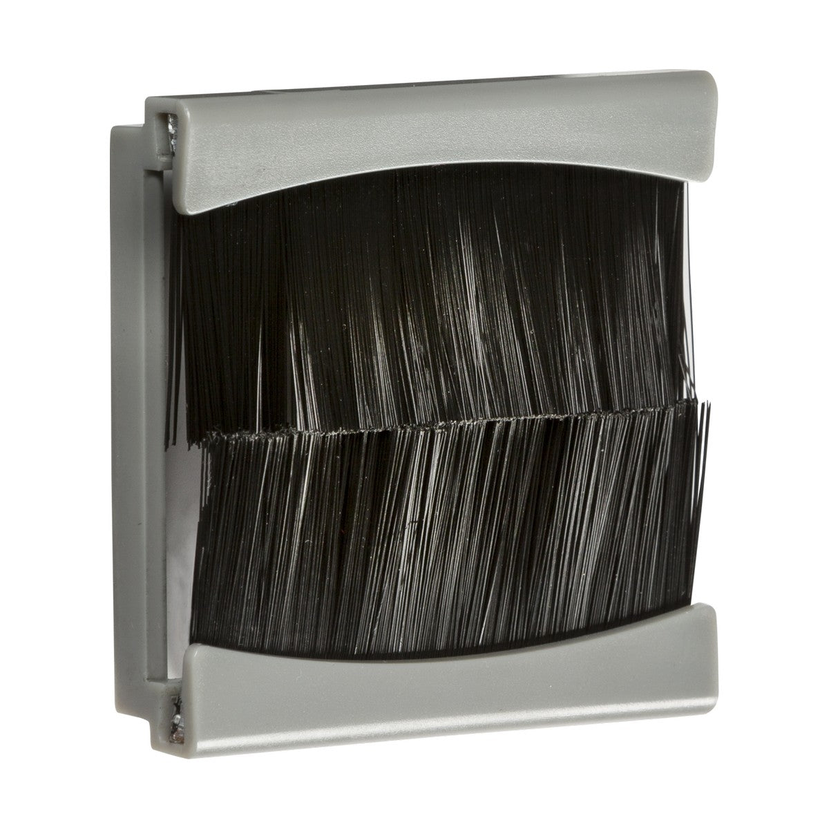 The Brush Module 50 X 50mm - Grey offers a stylish and efficient solution for cable management. With its gray frame accented by black bristles, it ensures cables are neatly organized and protected as they pass through walls, complementing the sleek appearance of a floating TV.