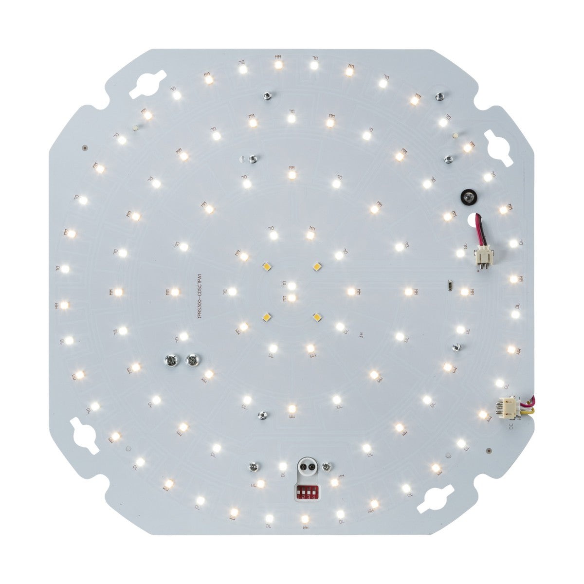 The TENAX 10-20W CCT Emergency LED Gear Tray with Daylight Sensor displays a circular arrangement of small illuminated lights and various electronic components, including connectors and chips, mounted on a white square LED circuit board. This color-adjustable innovation also comes with convenient push-fit terminals for easy installation.