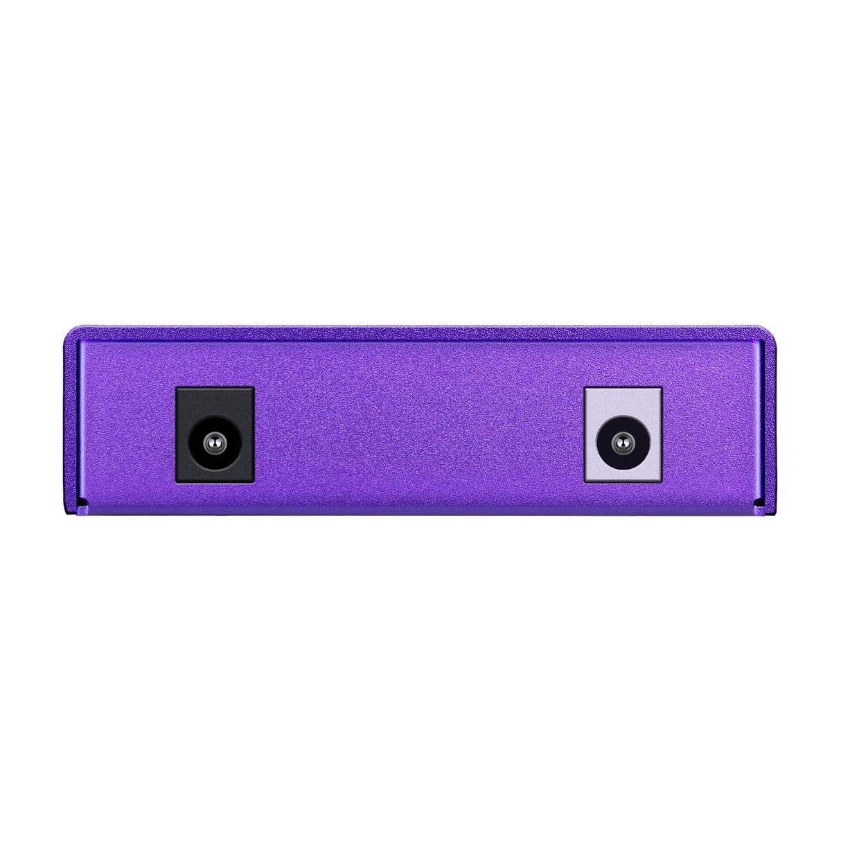 Side view of the NU-X NIP-Z6 Zeus Jr. purple isolated pedal power supply showing black DC input and grey output jack sockets on a white background.