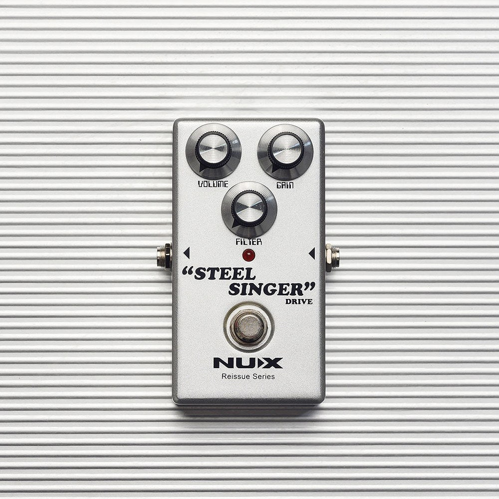 NU-X DIAB Steel Singer analog drive guitar pedal from AVSL with silver casing, Volume, Gain and Filter knobs, and true bypass footswitch on light grey.