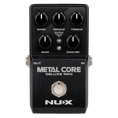 The NU-X Metal Core Deluxe MKII Pedal boasts a stylish black casing complemented by silver knobs for adjusting Bass, Middle, Treble, Gain, and Master. Perfectly suited for powerful performances, it incorporates IR cabinet simulation and comes equipped with input/output jacks within a compact design optimized for high-gain amplifier models.