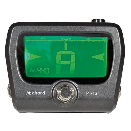 The Chord PT-12 Large Screen Pedal Tuner features a digital chromatic tuner with a backlit LCD display, clearly showing green-lit tuning indicators and labels. It includes a tuning bar with an upward-pointing arrow, and the brand name "Chord" along with the model number "PT-12" are prominently displayed on the front.