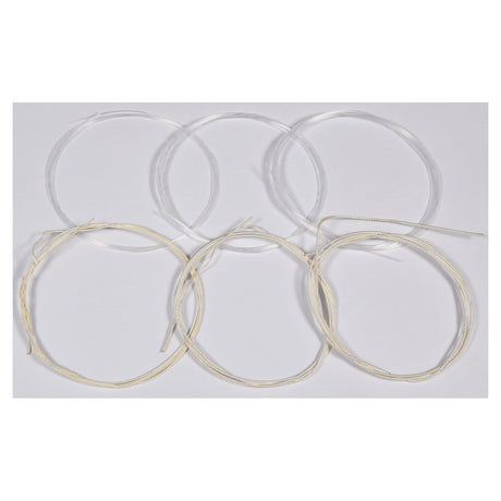 Six coiled sets of Chord Classic Guitar String Set NT are arranged in two rows on a plain background. The sets vary slightly in color, with some featuring silver-plated copper windings while others have a more golden hue.