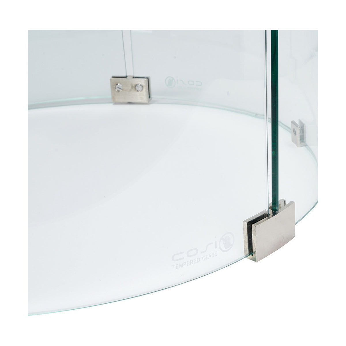 Close-up of the Cosiglass Set Large Fire Pit, 52cm tempered glass surround with curved edge and brushed metal mounting brackets secured by screws.