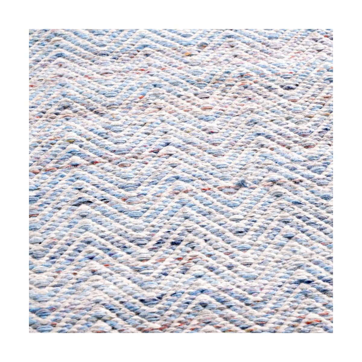 Close-up of the Indoor Outdoor Aqua Blue & White Inca Design Rug, 230 x 160cm, showing a woven chevron pattern in blue and white polyester.