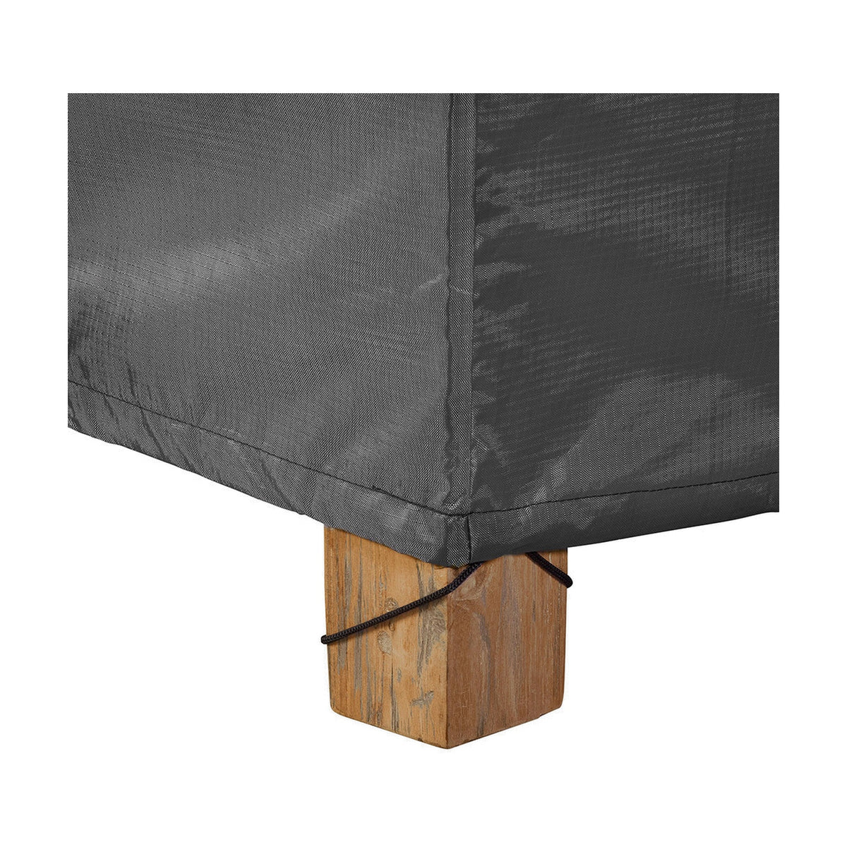 Close-up of the Sunbed Aerocover in anthracite fabric, 210 x 90cm, showing the corner seam secured with a drawcord over a wooden block foot.