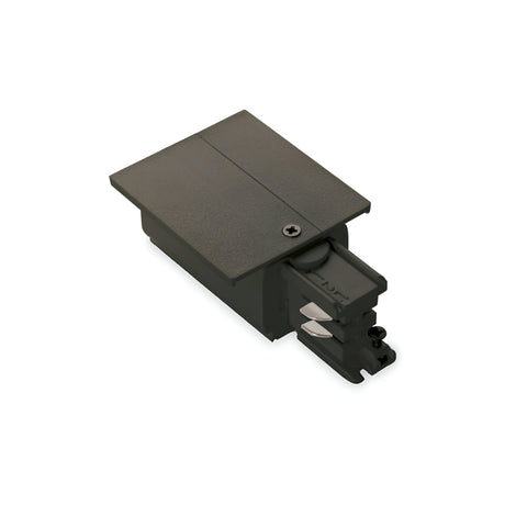 The Brillia 3-Phase Trim Track End-Right Power Input - On-Off in black is an electrical connector designed for 3-phase track lighting. It has a flat top cover with metallic attachments on one side, includes a single screw on the top surface, and features a protruding section at the bottom to facilitate easy power input.